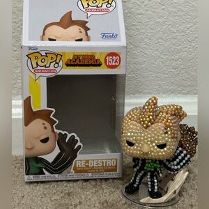 Funko Pop! Animation Re-Destro Figure with Green and Brown Accents